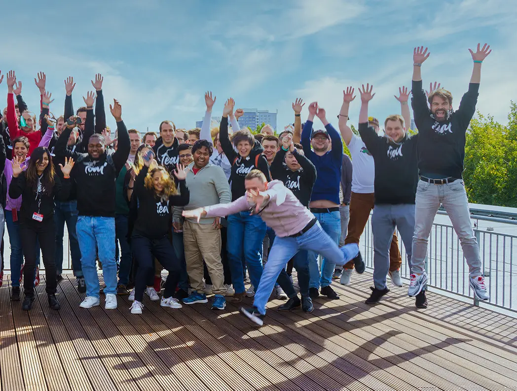 Tech team on rooftop terrace having fun